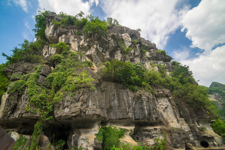 Tam Coc, Ninh Binh, Vietnam - September 14, 2014. mountain in a bayのeditorial素材