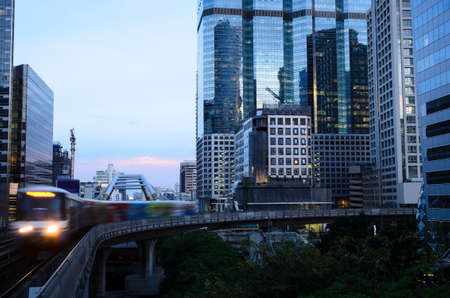 skytrain is running on the rail and cityscape viewの写真素材