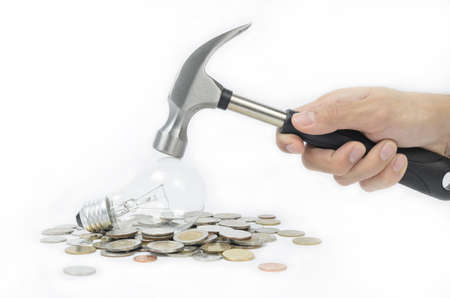 lost money too much with incandescent lamp, so change it like a hammer smash to get your money backの写真素材