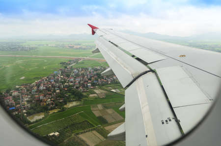 green field view from the airplane windowの写真素材