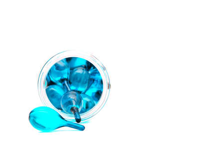 blue hair vitamin serum capsule in the bottleの写真素材