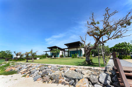 beautiful resort next to the beach on the blue sky dayのeditorial素材