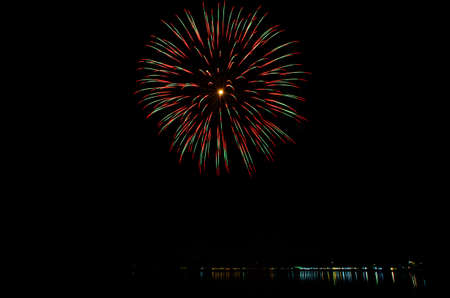 beautiful fireworks explosions  in the night skyの写真素材