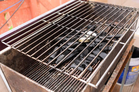 bbq grill grate and charcoalの写真素材