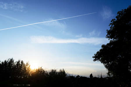 contrail on the blue skyの写真素材