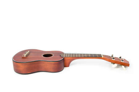 brown ukulele isolate on white backgroundの写真素材