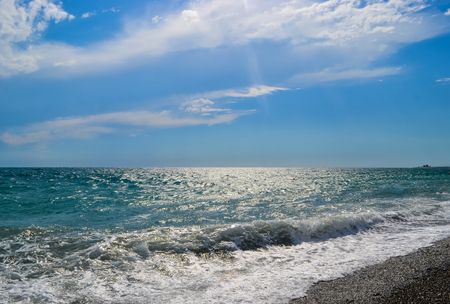 beautiful seascape sun and sea on blue sky backgroundの写真素材