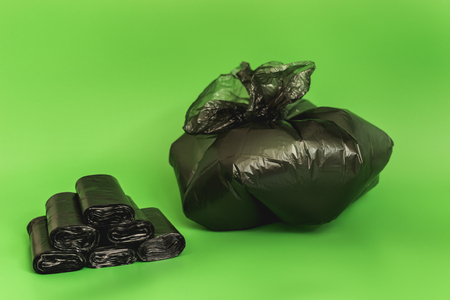 stacked black bags and bagged trash. take out the garbage.の写真素材