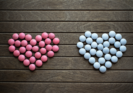 two hearts, chocolate dragees, a symbol of love for Valentine's day.の写真素材