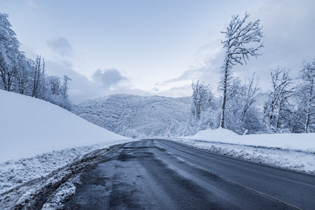 Mountain Road Winter Landscape Snow Path Automobile roadの写真素材