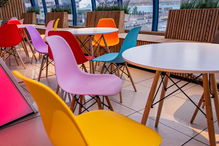 empty cafe colorful chairs there are no people inside quarantine ban on visiting restaurants vaccination absence moscow russiaの写真素材
