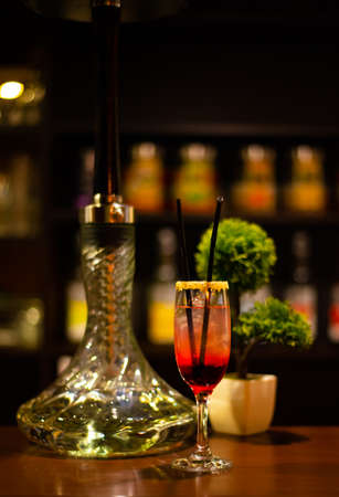 Fresh cherry cocktail. Fresh summer cocktail with cherry and ice cubes