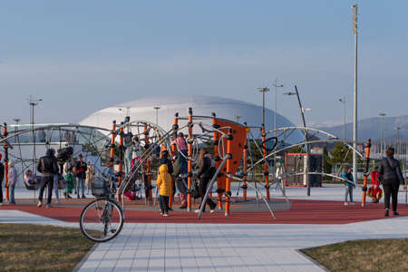 Red Rope Complex at the playground. Rope maze for children in the city park. construction, fixed on a metal rod and at the extreme points of the beams. Sochi, Russia April 1, 2022.のeditorial素材