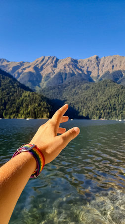 the hand reaches out to the horizon. a symbol of freedom. lgbtの写真素材