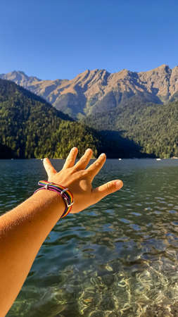 the hand reaches out to the horizon. a symbol of freedom. lgbt.の写真素材