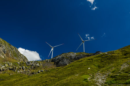 energy crisis. wind farm high in the mountains. Europe. wind power stationの写真素材