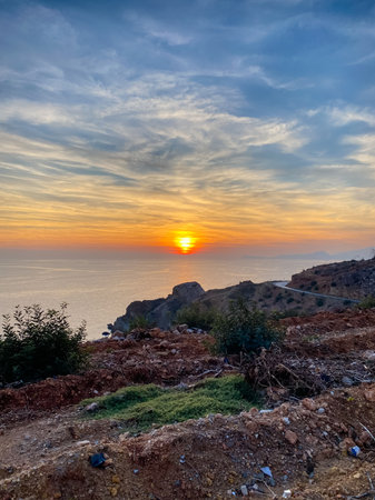 Bright beautiful sunrise or sunset at seaの写真素材