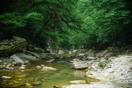 White Rock Canyon. winding gorge with clear blue water. The Khosta River flows along the cliffs...