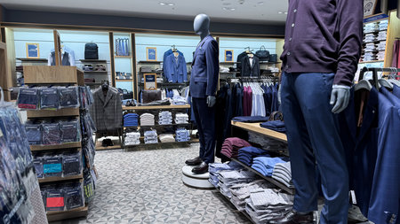 mens wardrobe. the range of clothes in the mens clothing storeの写真素材