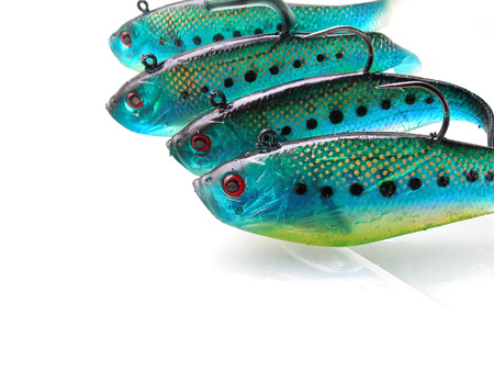 close up shot of green fish lures with sharp hooksの写真素材