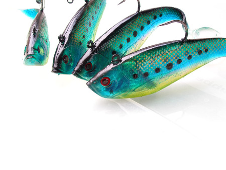 close up shot of green fish lures with sharp hooksの写真素材