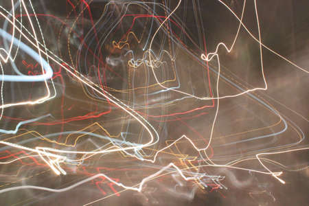 freezelight and neon light lanterns at night abstract black background