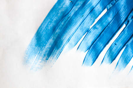 blue paint place for inscription with white backgroundの写真素材