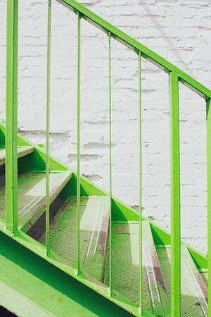 Green metal stairs. Trending color. Minimalism conceptの写真素材