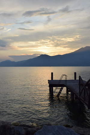 Portrait style sunset over Lake Garda, Italyのeditorial素材