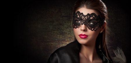 Portrait of attractive sensual young woman with maskの写真素材