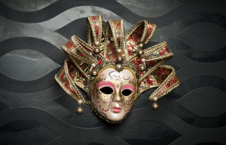 Beautiful classical mask from  Venice on black wall  Carnival mask  Venetian tradition  の写真素材
