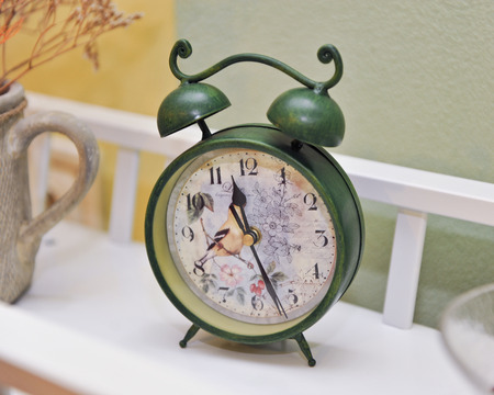 Vintage green colored clock