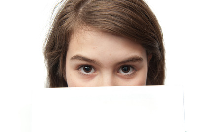 beautiful teen eyes over white paperの写真素材