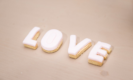 Wedding decor, LOVE letters on table. LOVE decoration on festive table. Luxurious wedding decoration on restaurant table. Elegant eventの写真素材