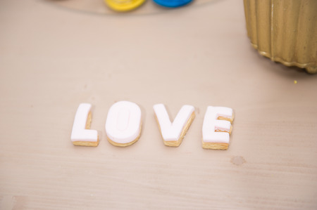 Wedding decor, LOVE letters on table. LOVE decoration on festive table. Luxurious wedding decoration on restaurant table. Elegant eventの写真素材