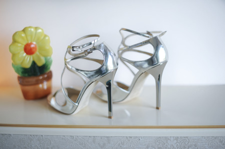 wedding concept with silver shoes. High heels wedding shoes.の写真素材