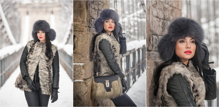 Attractive woman with black fur cap and gray waistcoat enjoying the winter. Side view of fashionable brunette girl posing against snow covered bridge. Beautiful young female with cold weather outfitの写真素材