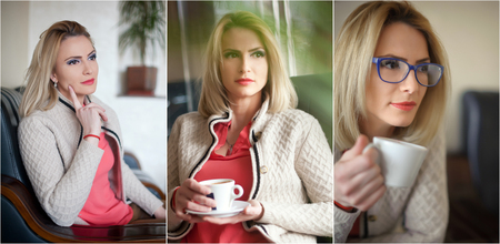 Attractive sexy blonde in white sweater over pink blouse holding a cup of coffee. Portrait of...