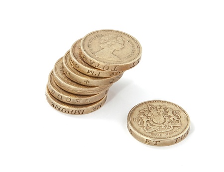 British, UK, pound coins on a plain white background.の写真素材