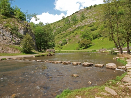 Stepping stones (placed about 1856) over the river Dove in Dovedale in Derbyshire.  Dovedale is part...