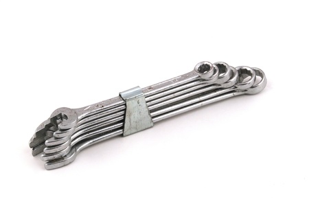 Set of chrome spanners on a white background 