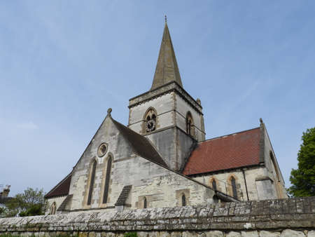 Christ Church Brockham Surrey viewed from south east worms eye view includes church yard wall