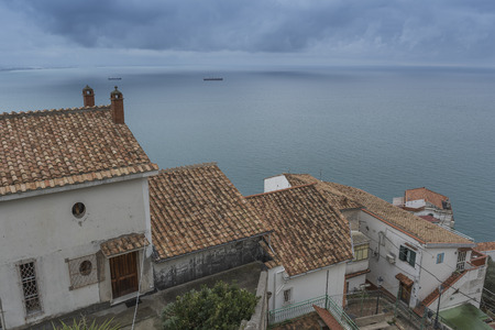 view of Vietri sul Mare - Old Town and the beach, gray sky with large clouds.の写真素材