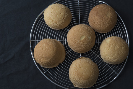 Lemon delight. typical sweet Italian. Sweet of the Amalfi and Sorrento coast. Sponge cake dome before filling creams. fundamental element. black background.の写真素材