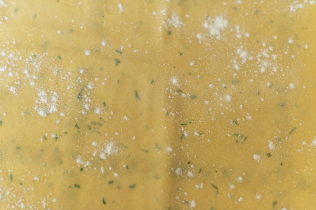 Lagane. Homemade Italian pasta. Hand cut on wooden chopping board. Excellent with legumes, chickpeas or beans and seafood. Handcrafted processing techniques.の写真素材