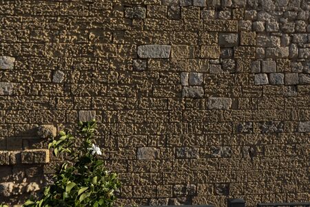 Views of Castro at sunset. Ancient Aragonese walls between blue skies, blue sea and yellow earth. Lecce stone walls and white houses.の写真素材