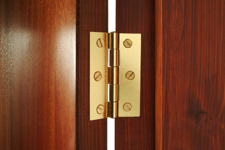Brass hinge on internal doorの写真素材