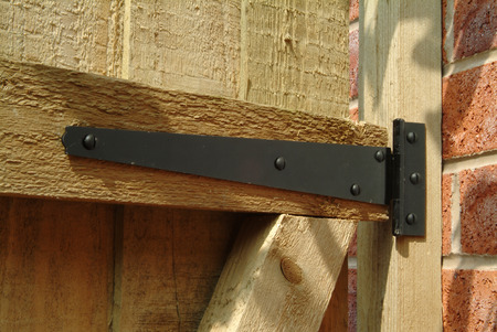 T hinge on wooden garden gateの写真素材