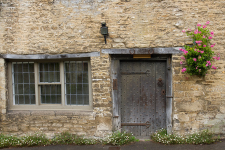 Doorway in idyllic cottage, Castle Combe, Wiltshire, UKのeditorial素材