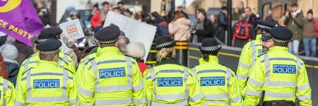 Westminster, London, UK; 29th January 2019; Panoramic View of Group of Metropolitan Police Officers Policing a Pro-Brexit Demonstration Outside Parliamentのeditorial素材
